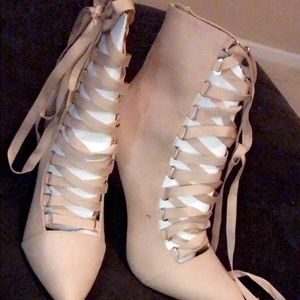 Laced up pointed toe booties